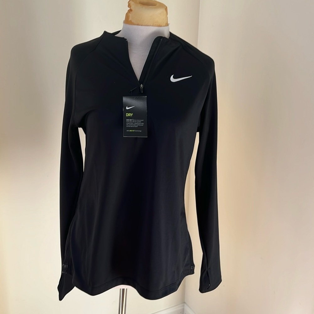 New! Nike dri fit women’s medium 1/4 zip long sleeve top.
